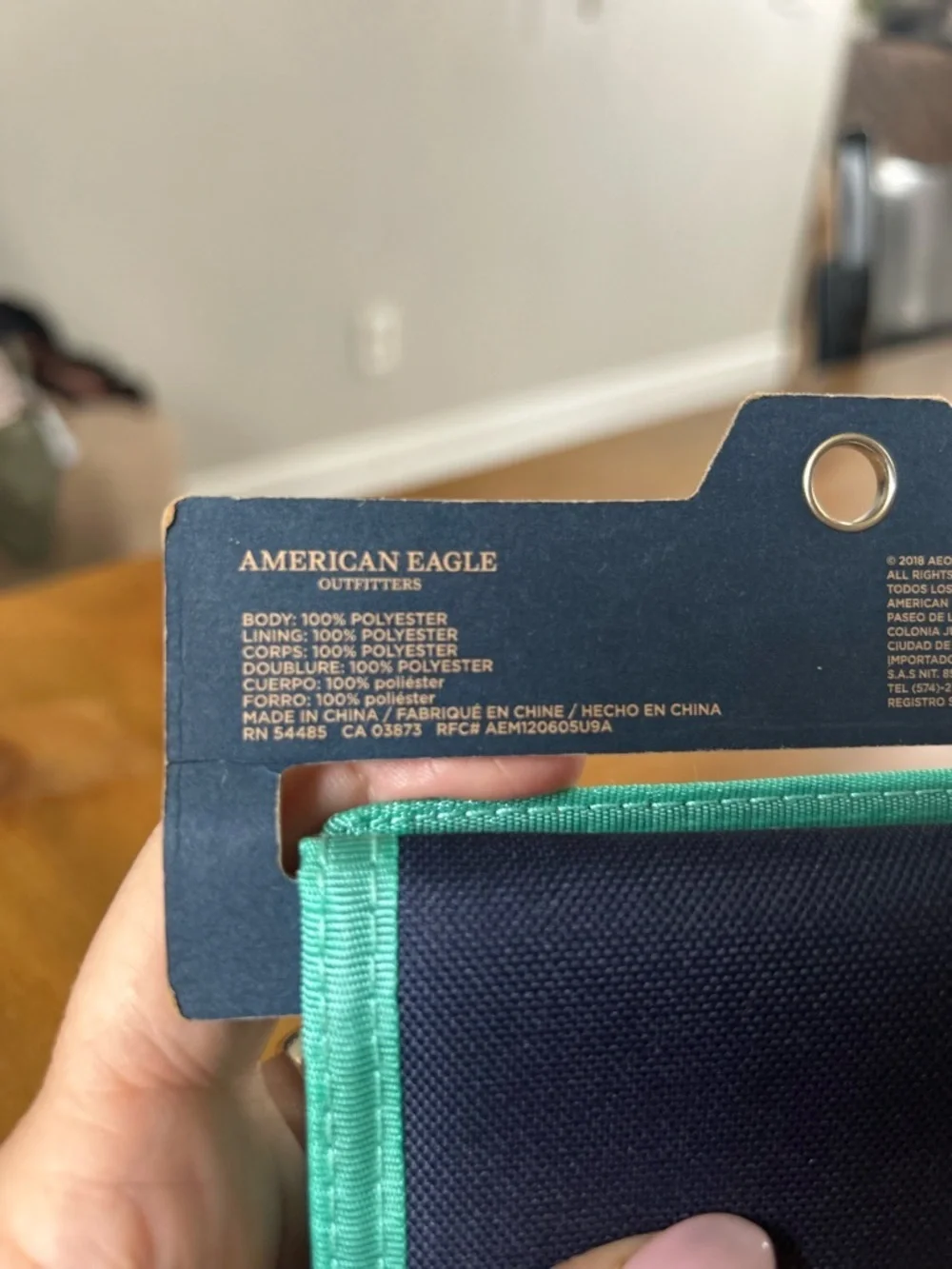 NWT AEO Navy Trifold Wallet with Mint Trim